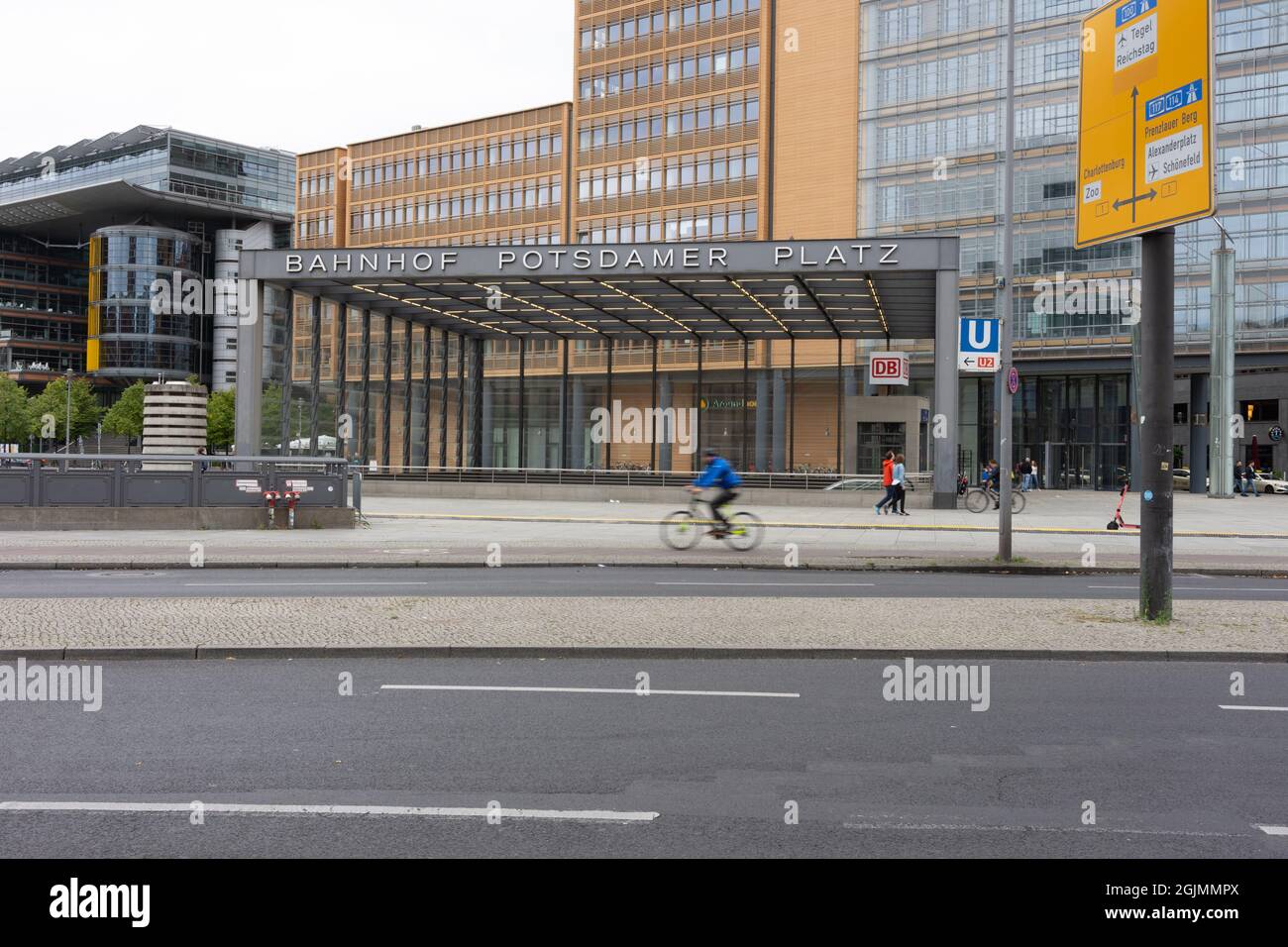 Potsdamer Platz station with cyclists and pedestrians Stock Photo - Alamy