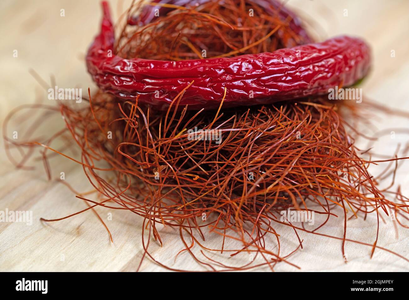 Chilli threads and chilli pod in a close-up Stock Photo