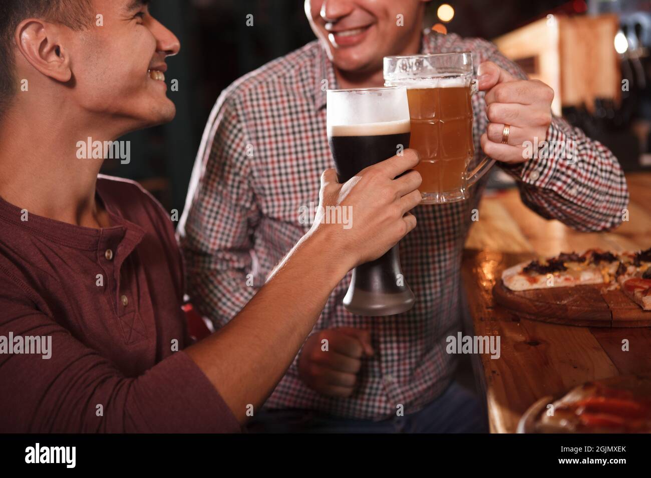 Cropped shot men clinking hi-res stock photography and images - Alamy