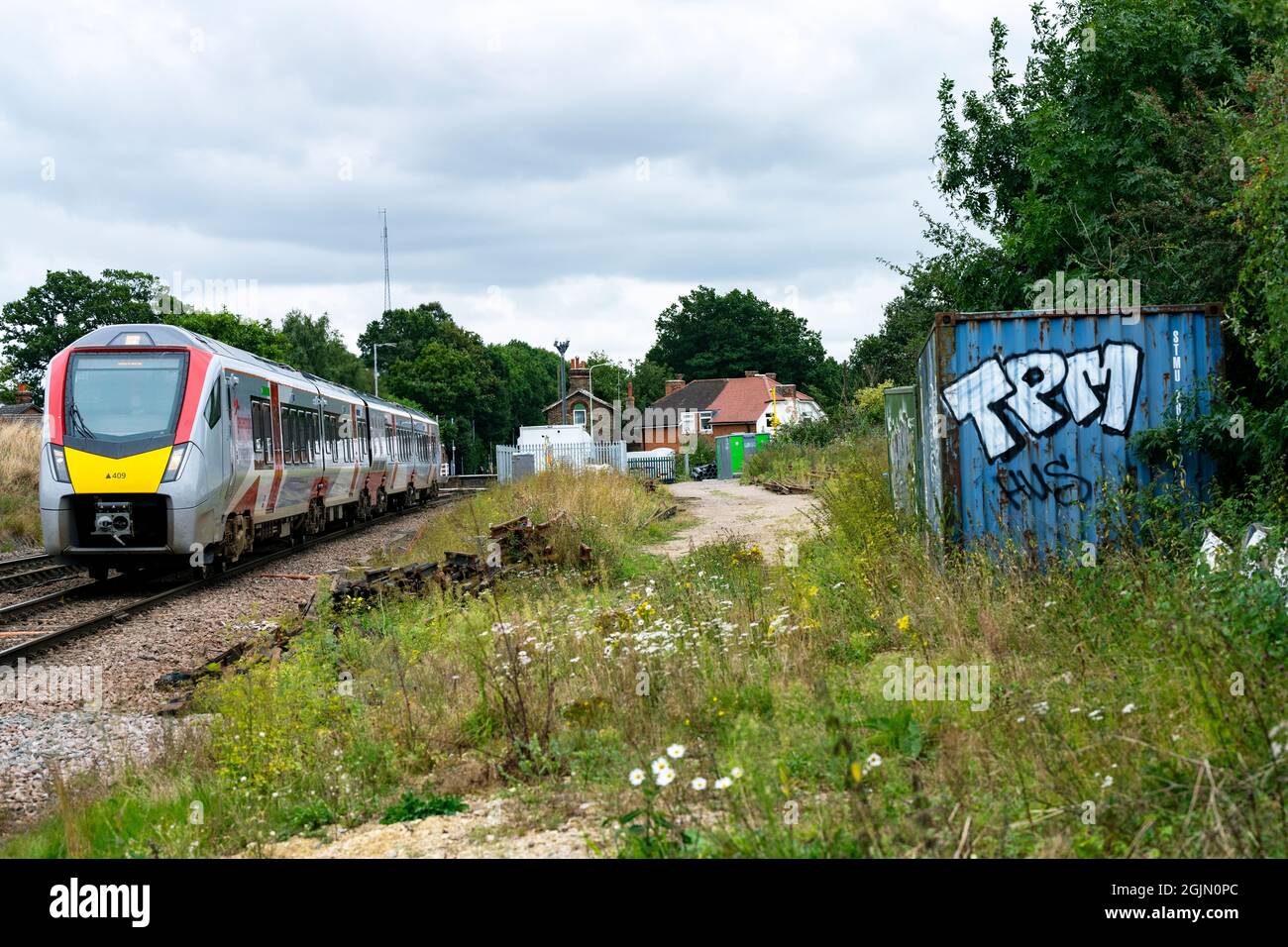 GreaterAnglia passenger train on the East Suffolk branch line though Westerfield heading towards Ipswich. Stock Photo
