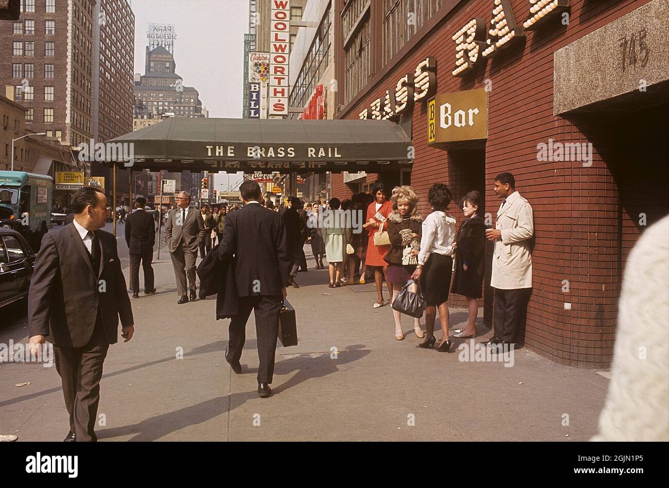 USA New York 1967. Street view with people in front of the restaurant The Brass  Rail. Kodachrome slide original. Credit Roland Palm ref 6-10-17 Stock Photo  - Alamy