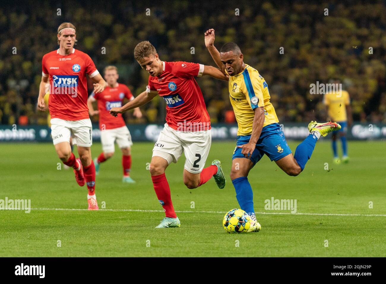 Brondby, Denmark. 10th Sep, 2021. Kevin Mensah (14) of Broendby IF and Rasmus Carstensen (2) from Silkeborg IF seen during the 3F Superliga match between Broendby IF and Silkeborg IF at Brondby Stadion. (Photo Credit: Gonzales Photo/Alamy Live News Stock Photo