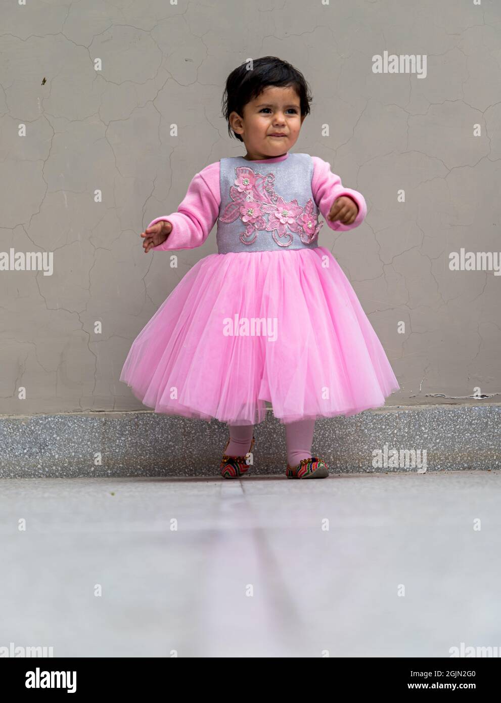 portrait in pink dress of cute indian baby girl Stock Photo - Alamy