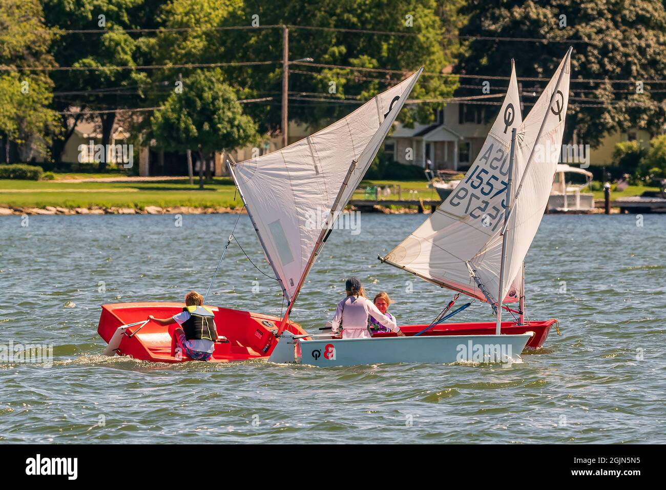 The sail training foundation holds youth sail training classes Fridays from May through October, in the channel between Lake Michigan and Green Bay. Stock Photo