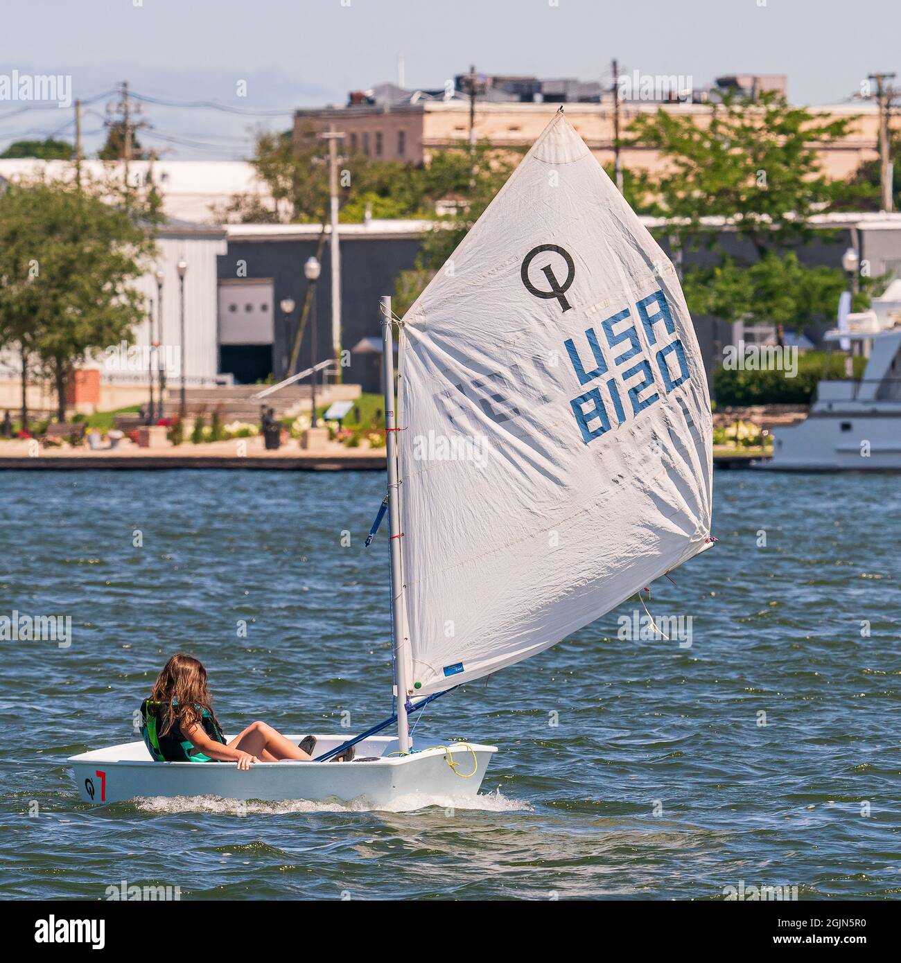 The sail training foundation holds youth sail training classes Fridays from May through October, in the channel between Lake Michigan and Green Bay. Stock Photo