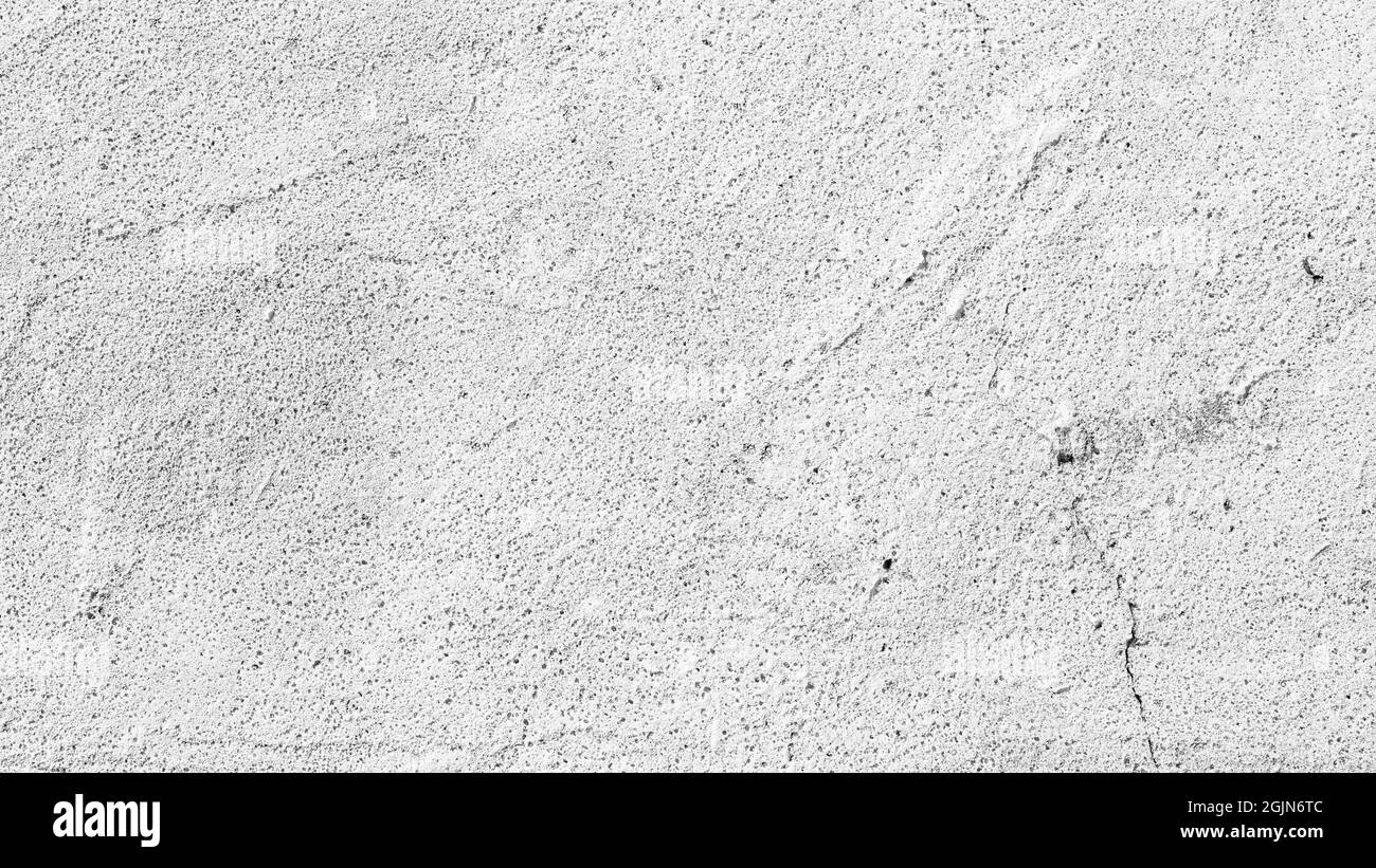 White rough whitewashed wall texture. Texture of gray concrete wall