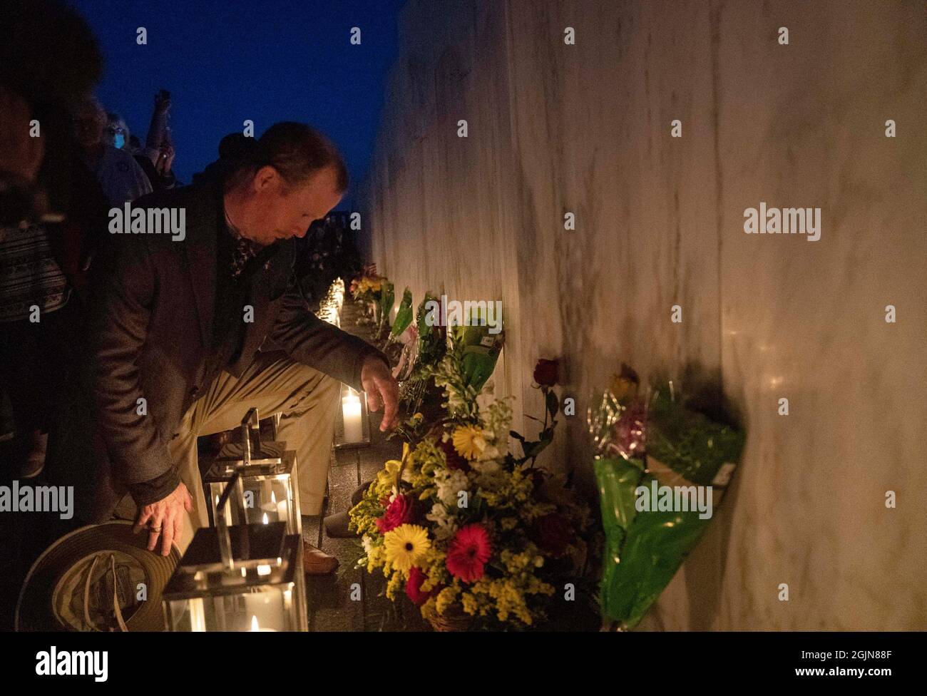 Washington DC, USA. 10th Sep, 2021. People visit the Wall of Names during a candlelight memorial