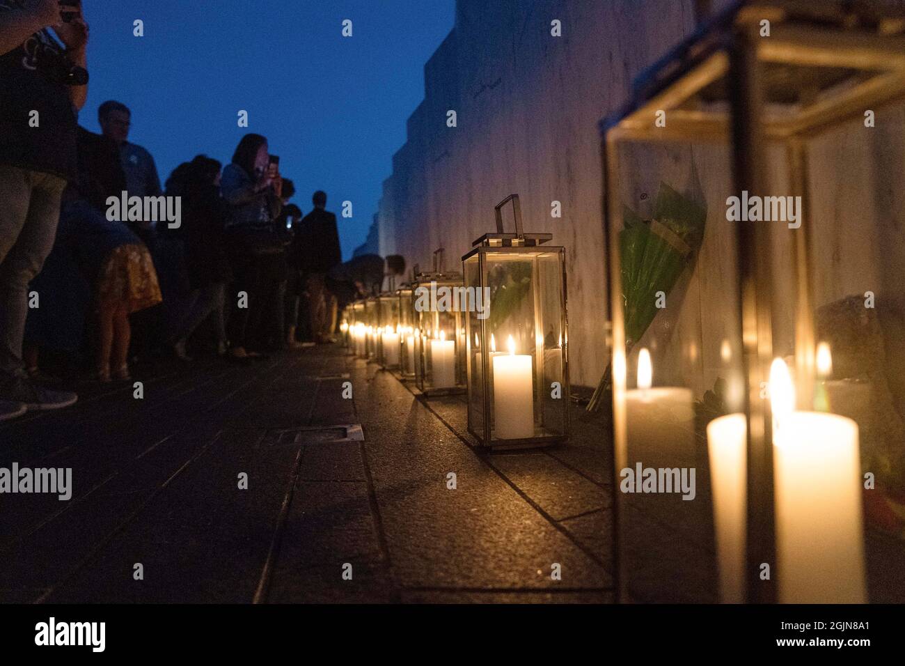 Washington DC, USA. 10th Sep, 2021. People visit the Wall of Names during a candlelight memorial