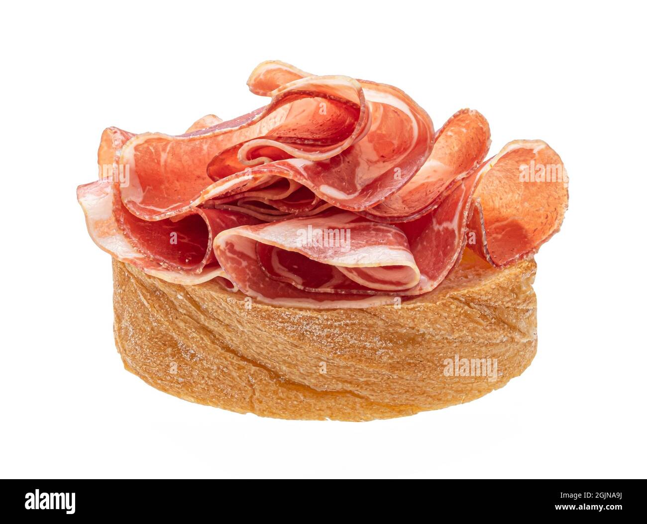 Bruschetta with bacon isolated on white background Stock Photo
