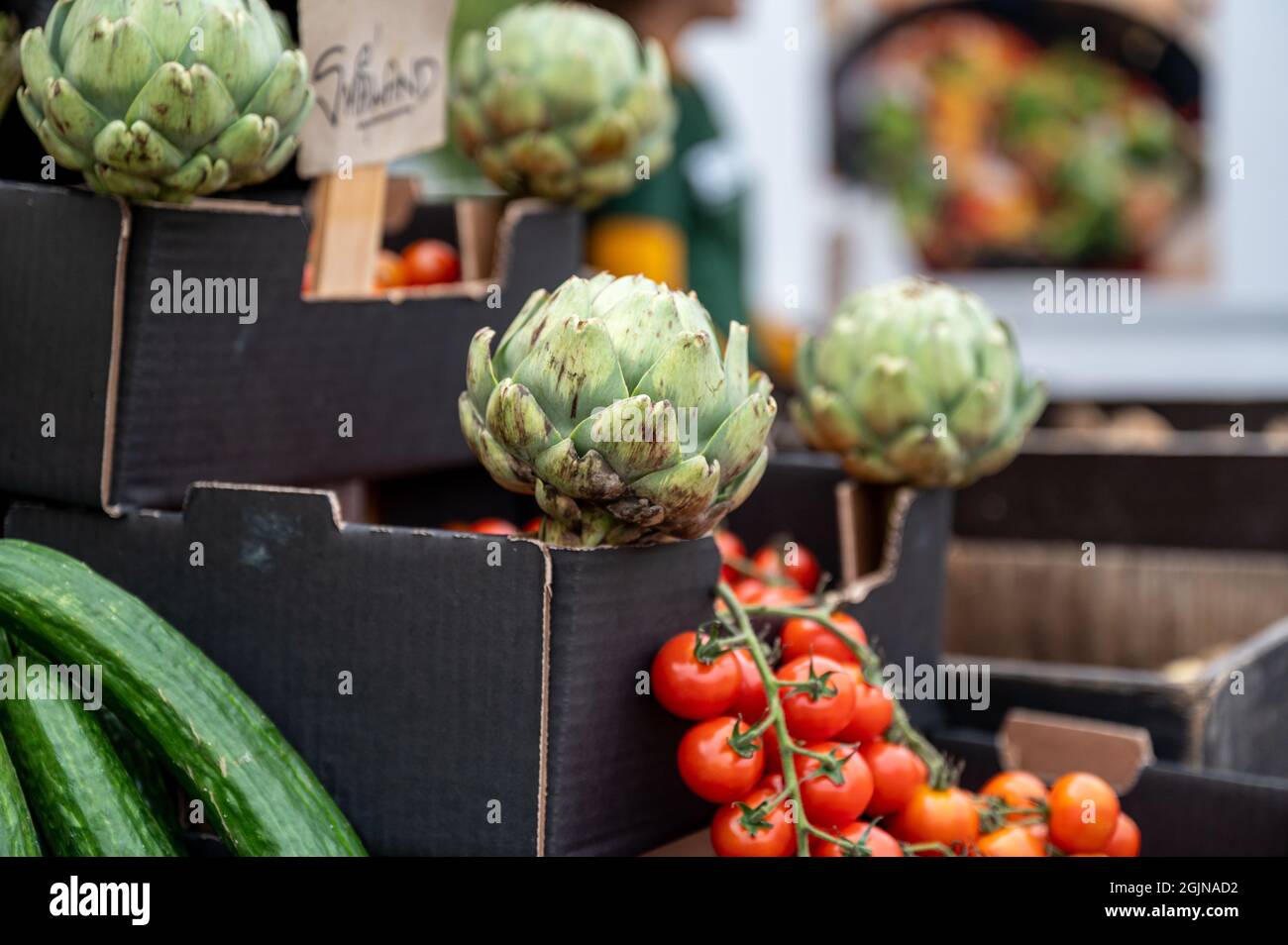 Vegetables and root vegetables for sale at a market in on
