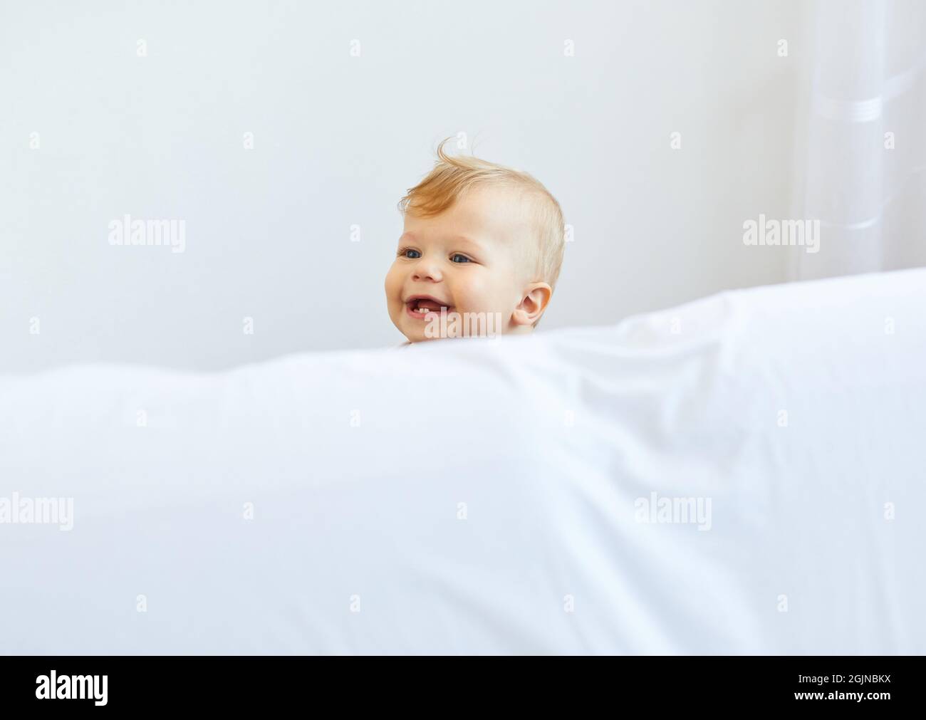 child baby boy playing childhood toy toddler cute fun little Stock Photo