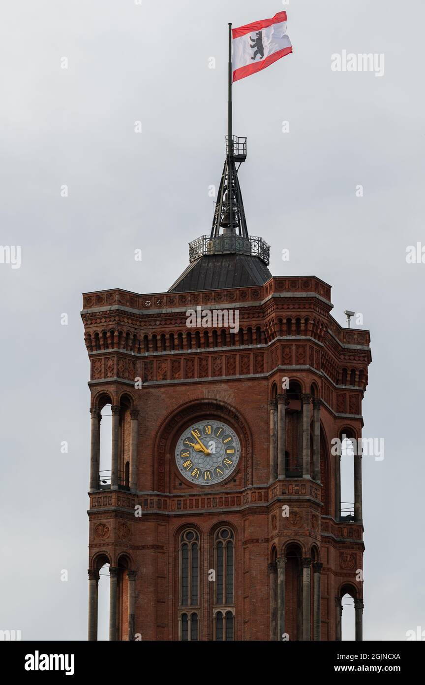 Tower of the Red Town Hall with the flag of Berlin Stock Photo