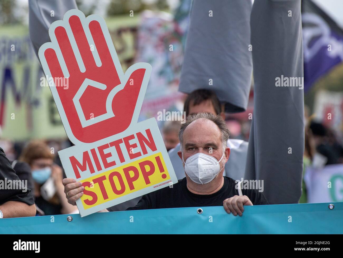 Berlin, Germany. 11th Sep, 2021. During a demonstration against high rents in Berlin, a participant holds a placard with the inscription 'Mieten Stopp!'. Credit: Christophe Gateau/dpa/Alamy Live News Stock Photo