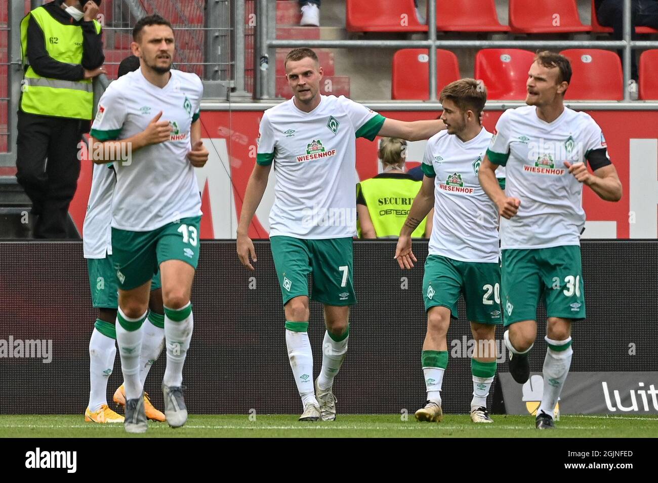 Ingolstadt, Germany. 11th Sep, 2021. Football: 2nd Bundesliga, FC Ingolstadt 04 - Werder Bremen, Matchday 6, Audi Sportpark. Bremen's Marvin Ducksch (centre) celebrates after scoring the 0:3 goal. Credit: Armin Weigel/dpa - IMPORTANT NOTE: In accordance with the regulations of the DFL Deutsche Fußball Liga and/or the DFB Deutscher Fußball-Bund, it is prohibited to use or have used photographs taken in the stadium and/or of the match in the form of sequence pictures and/or video-like photo series./dpa/Alamy Live News Stock Photo