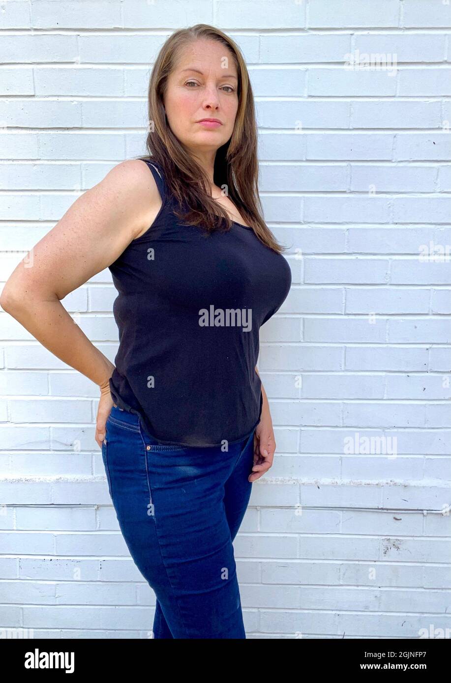 attractive, bbw, beautiful, beauty, big, body positive, brunette, busty,  clothing, confidence, curve, curvy, fashion, female, figure hugging, fitted  Stock Photo - Alamy