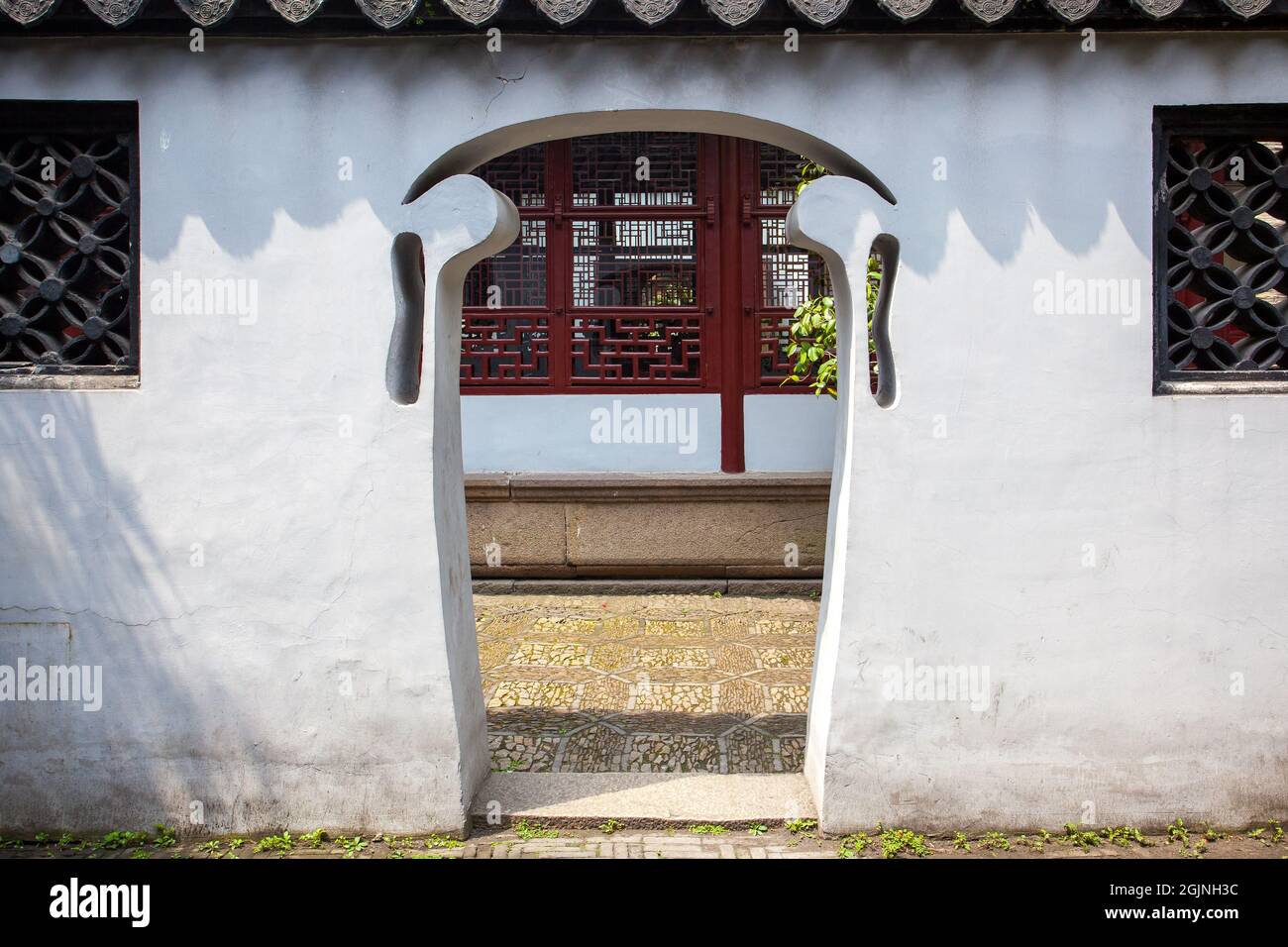 Odd in shape doorway in ancient Yu Yuan Garden in Shanghai, China Stock Photo