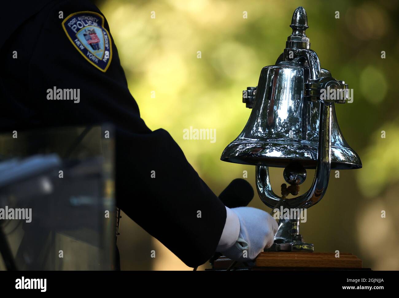 New York, USA. 11th Sep, 2021. A bell is tolled as September 11 victims names are read during the 20th annual 9/11 Commemoration Ceremony at the National 9/11 Memorial and Museum in New York City, N.Y., on September 11, 2021. Pool photo by Chip Somodevilla/UPI Credit: UPI/Alamy Live News Stock Photo
