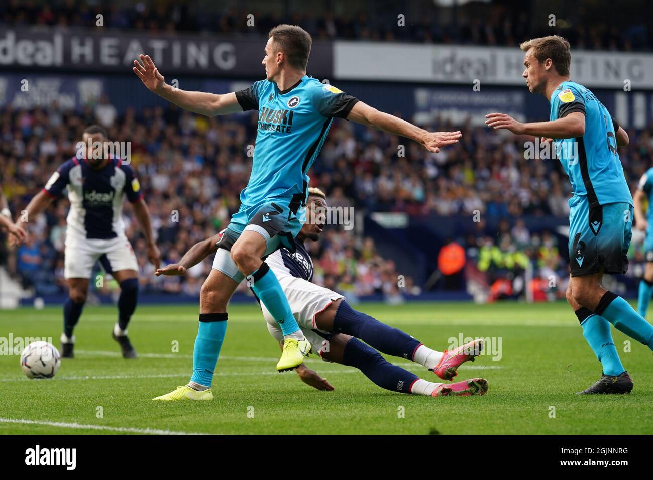 West Bromwich Albion's Grady Diangana is fouled Millwall's Jed Wallace and is subsequently awarded during the Sky Bet Championship match at The Hawthorns, West Bromwich. Picture date: Saturday September 11, 2021. Stock Photo