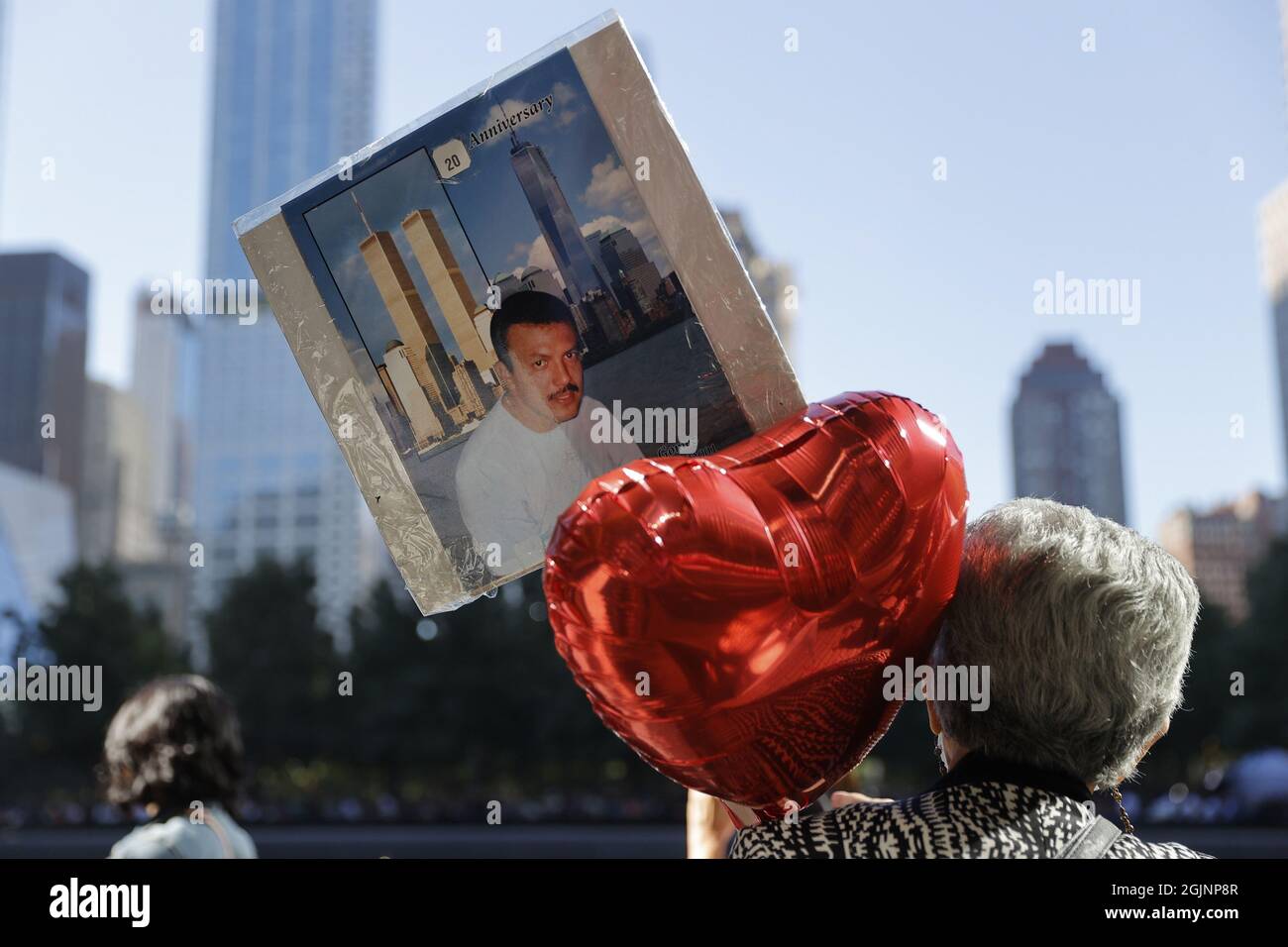 new-york-city-usa-11th-sep-2021-a-person-holding-a-balloon-and-a