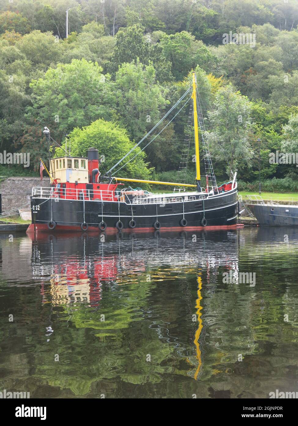 Built as a wartime supplies boat, the VC 32 was a Clyde Puffer and is now  moored in the harbour at the Crinan Canal on Scotland's west coast Stock  Photo - Alamy