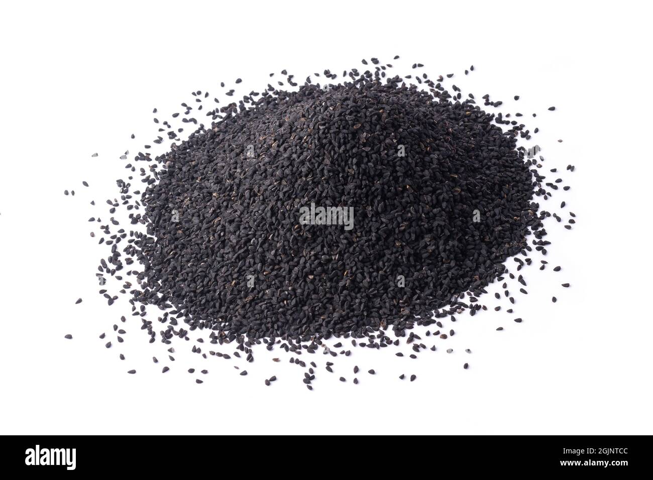 heap of black seeds, also known as black cumin or caraway or kalonji, isolated on white background, closeup Stock Photo