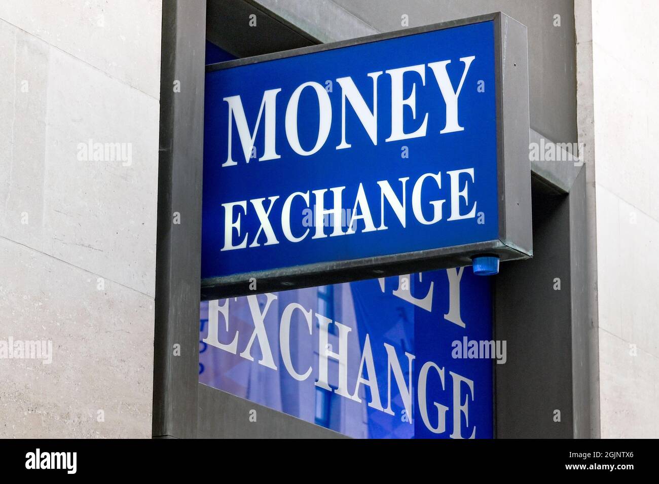 Sign above the entrance to a currency exchange shop Stock Photo Alamy