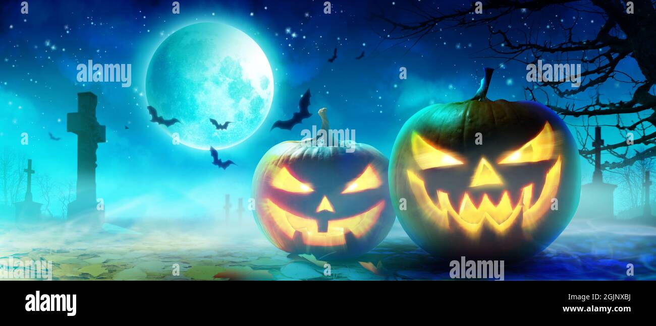 Halloween background with pumpkin in a spooky night Stock Photo - Alamy