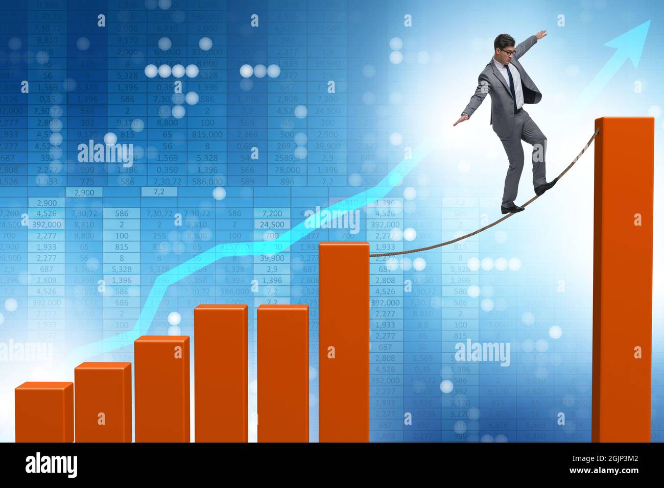 Businessman walking on the tight rope between bar chart Stock Photo Alamy