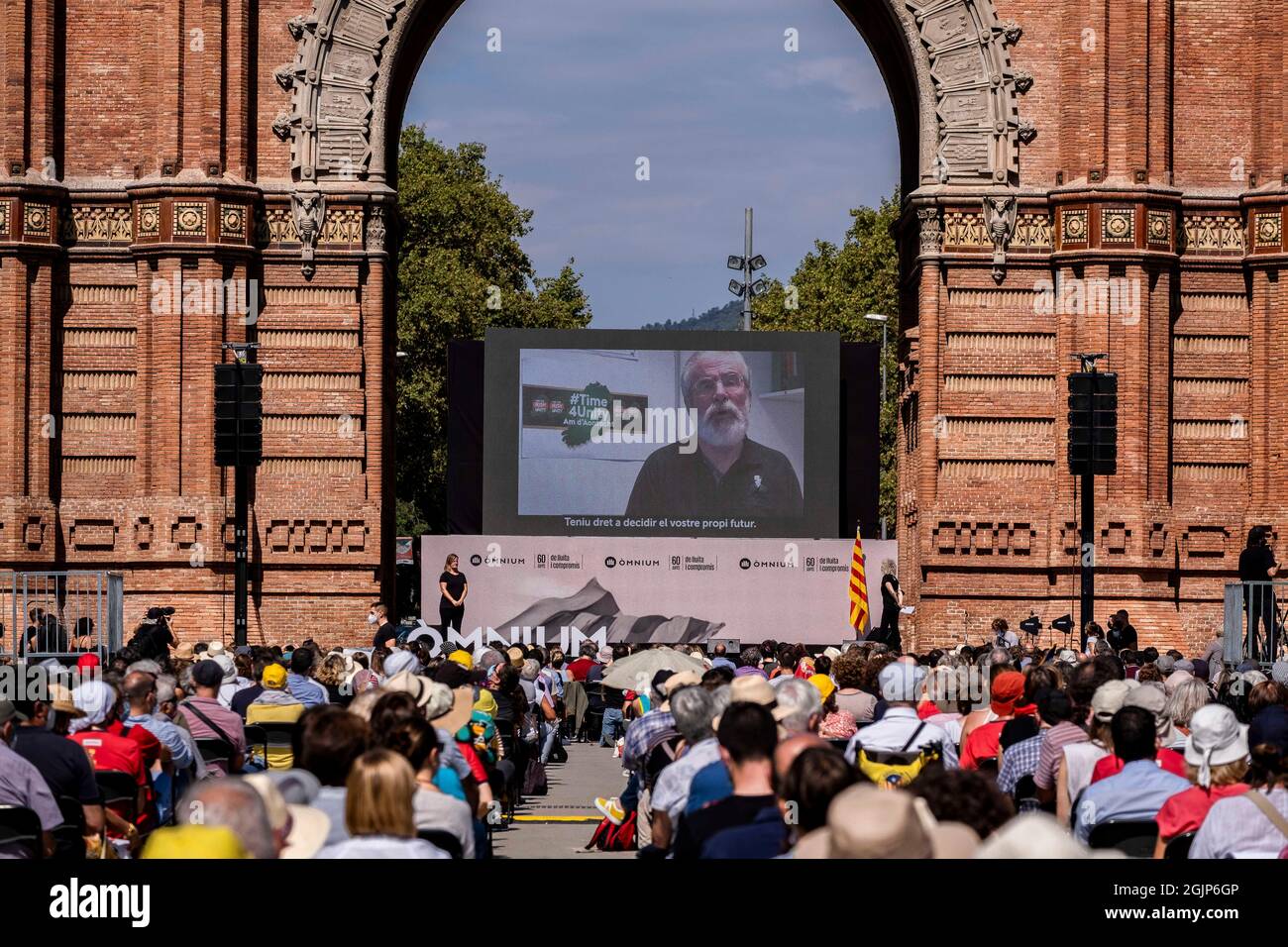 Barcelona, Spain. 11th Sep, 2021. The former president of Sinn Féin, Gerry Adams is seen on a screen addressing the public during the political act of 'mnium Cultural.Catalonia celebrates the traditional Diada de Catalunya 2021 with a wreath to Rafael de Casanova in Barcelona, the first act of a day full of reading manifestos, rallies and public demonstrations. Credit: SOPA Images Limited/Alamy Live News Stock Photo