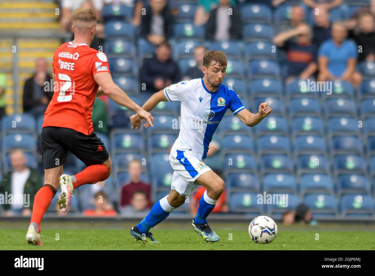 Harry Pickering #3 of Blackburn Rovers looks for a way past James Bree ...