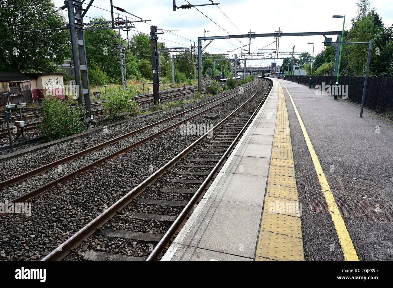 Catenaries at Litchfield Trent valley station in the UK Stock Photo - Alamy