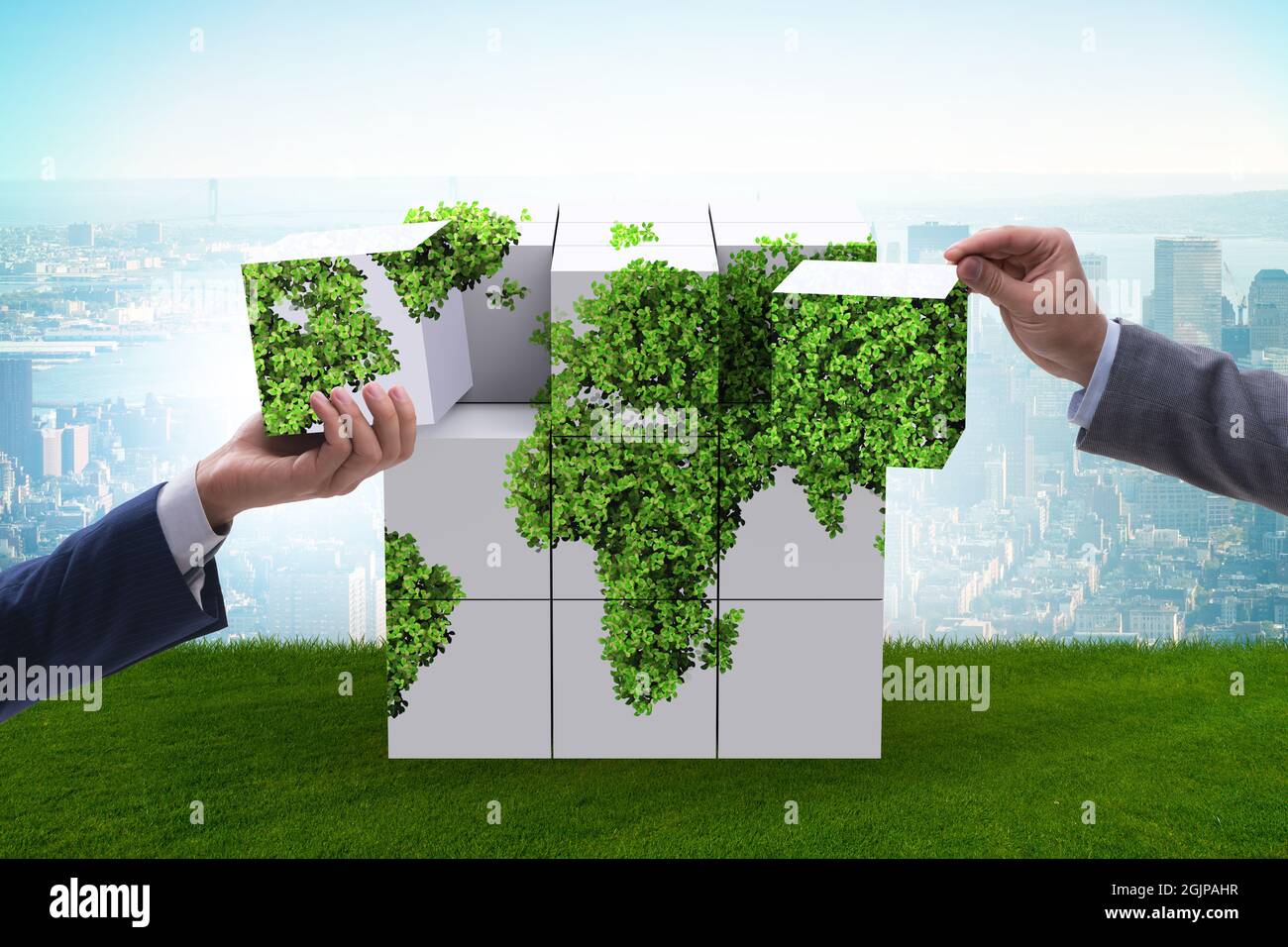 Businessman building world map from the cubes Stock Photo - Alamy