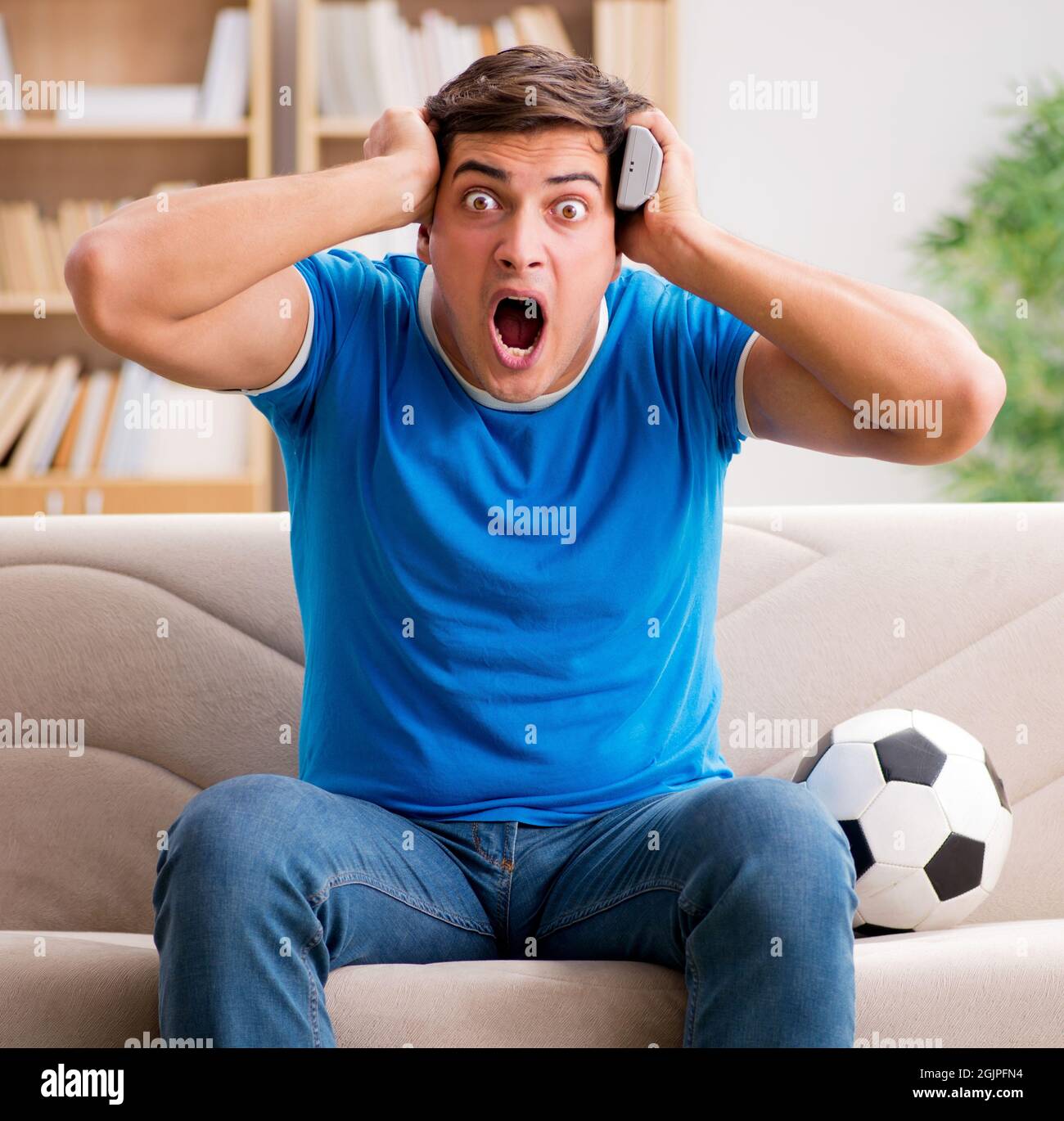 The Man Watching Football At Home Stock Photo Alamy the-man-watching-football-at-home-stock-photo-alamy