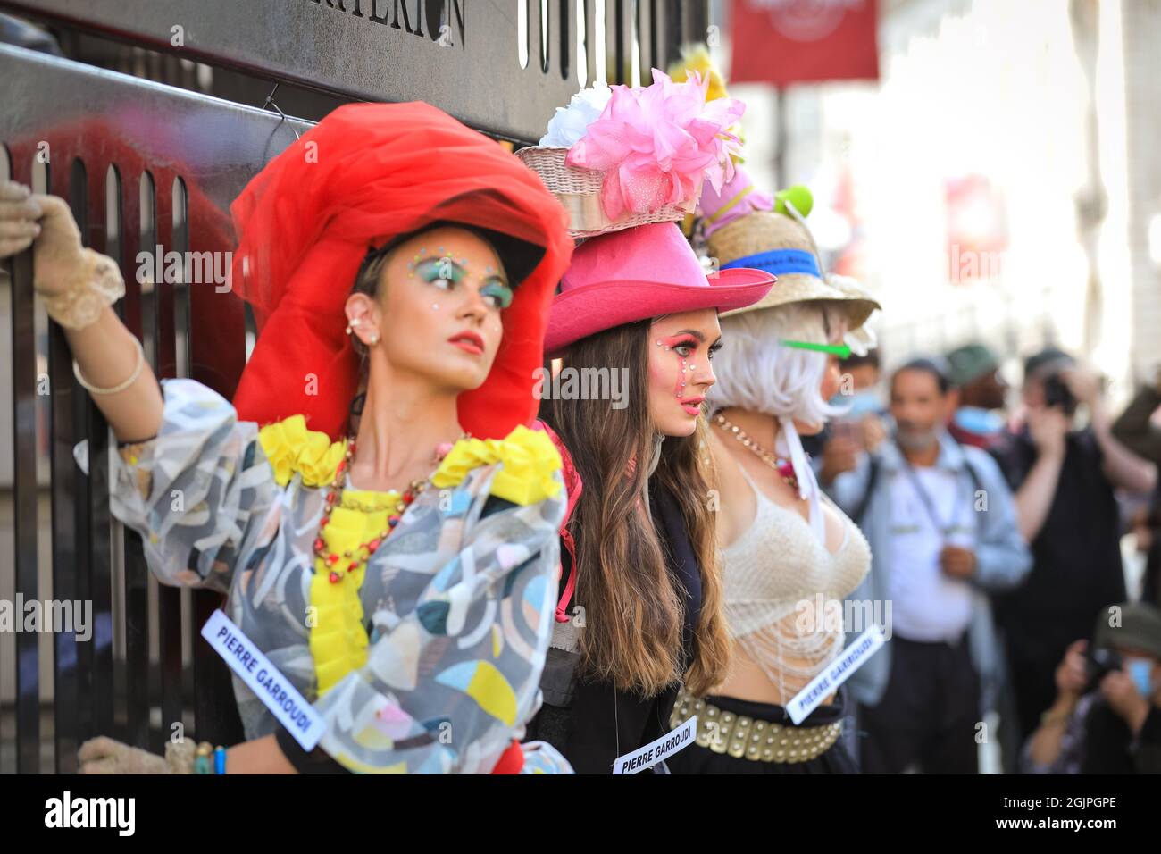 London, UK. 11th Sep, 2021. Models pose in extravagant outfits and accessories at a flashmob street fashion show for designer Pierre Garroudi in the streets of central London. Credit: Imageplotter/Alamy Live News Stock Photo