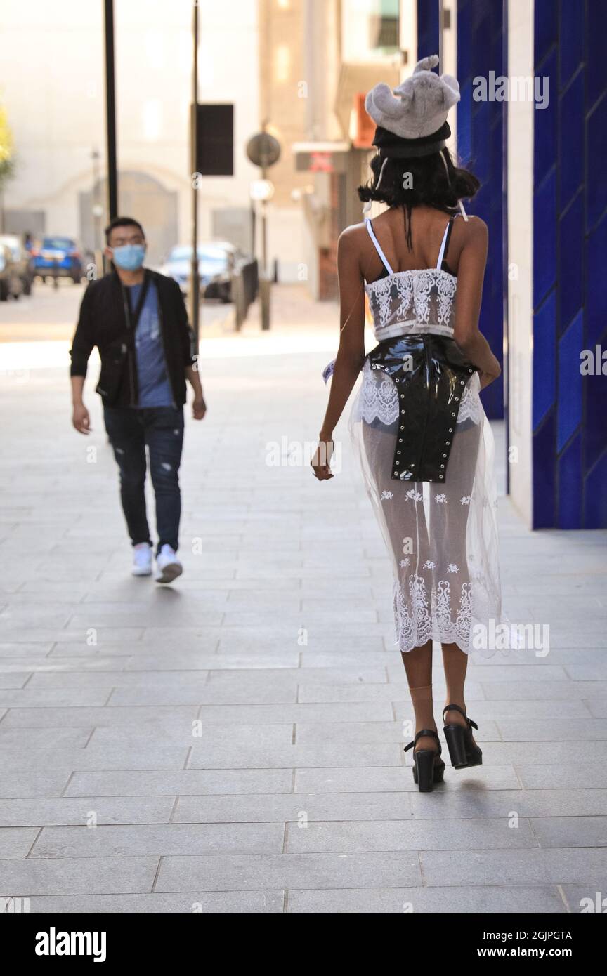 London, UK. 11th Sep, 2021. Models pose in extravagant outfits and accessories at a flashmob street fashion show for designer Pierre Garroudi in the streets of central London. Credit: Imageplotter/Alamy Live News Stock Photo