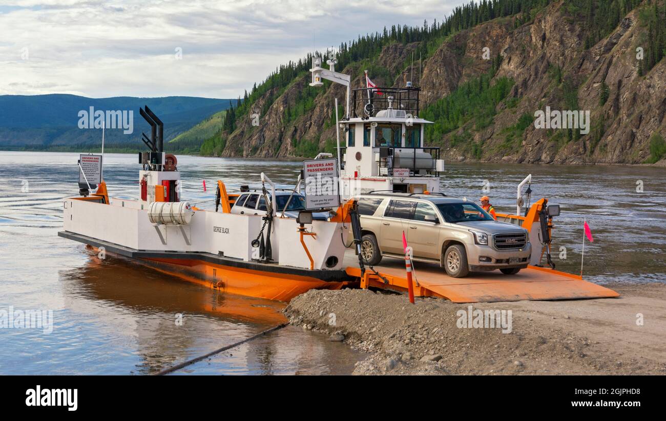 Canada, Yukon Territory, Dawson City, Yukon River, car ferry at landing Stock Photo