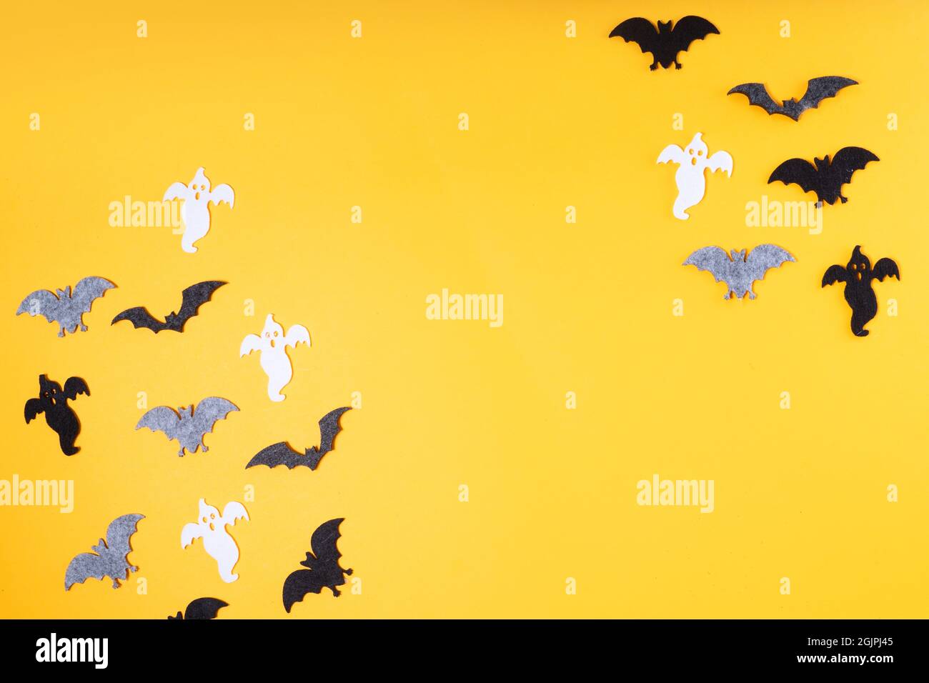 Halloween scene on orange background Stock Photo - Alamy