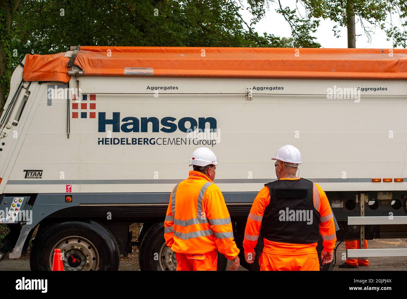 Aylesbury, Buckinghamshire, UK. 9th September, 2021. A Hanson lorry leaving one of the HS2 High Speed Rail 2 compounds in Aylesbury. Hanson lorry drivers are balloting for industrial action and are a big supplier of concrete and aggregates to HS2 Ltd. Credit: Maureen McLean/Alamy Live News Stock Photo