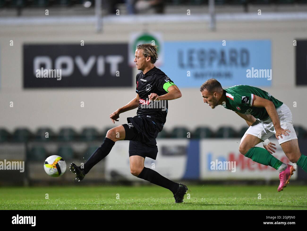 Lommel's Glenn Neven, 0 and Virton's Din Sula fight for the ball during a soccer match between Royal Excelsior Virton and Lommel SK, Saturday 11 Septe Stock Photo