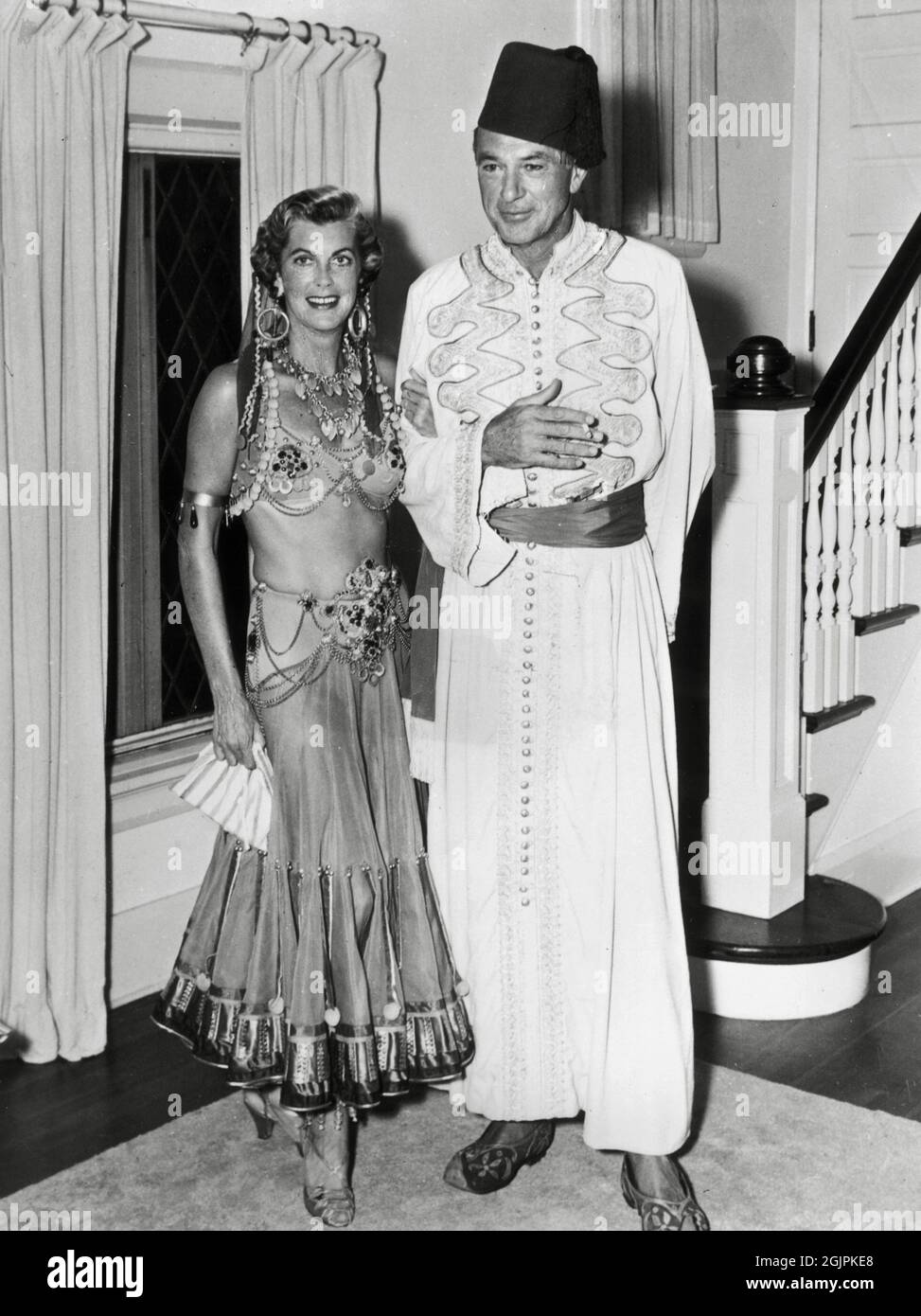 Gary Cooper in costume with his wife, Veronica Balfe, circa 1947 / File Reference # 34145-456THA Stock Photo