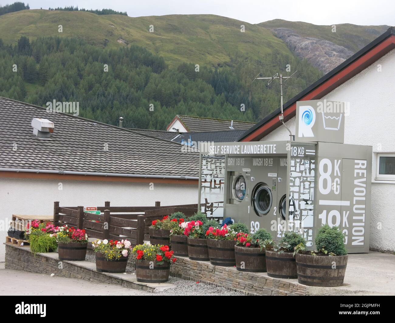 The Green Welly Stop on the A82 is a well-known stopping-off point for petrol, shopping, refreshments and traveller services such as a launderette. Stock Photo