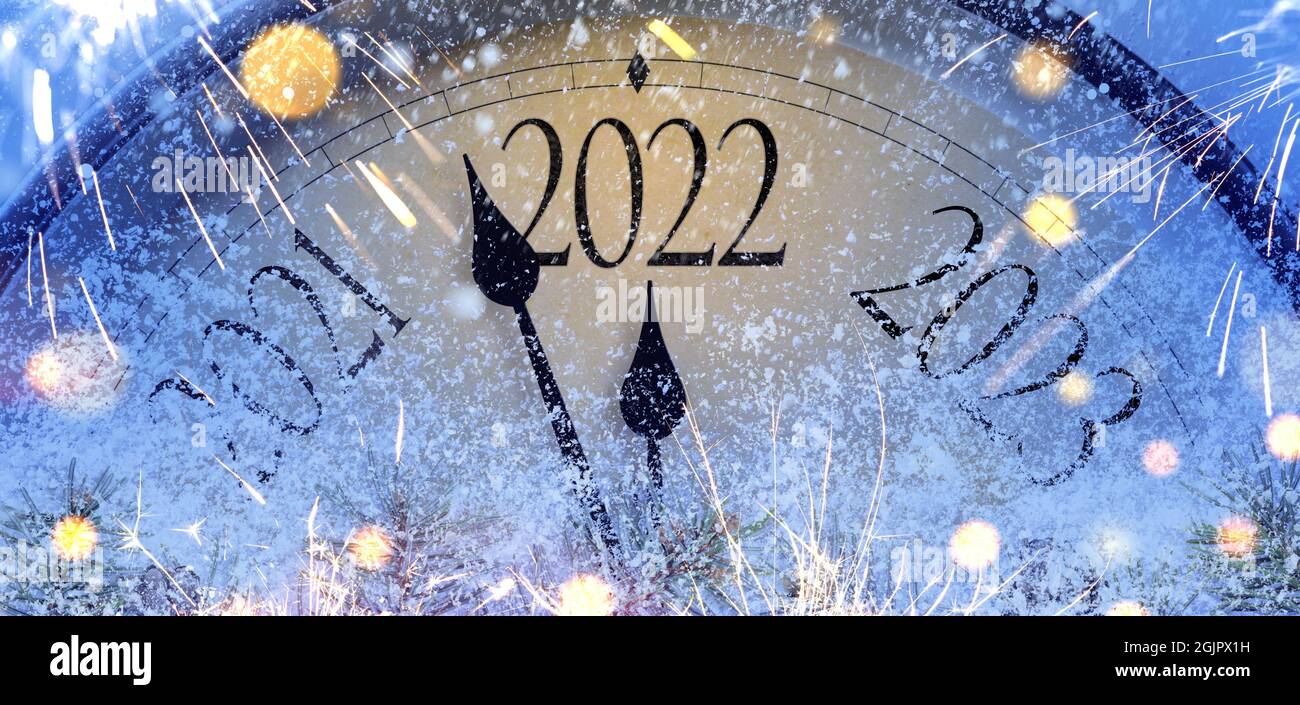 Countdown to midnight. Retro style clock counting last moments before Christmas or New Year 2022 Stock Photo
