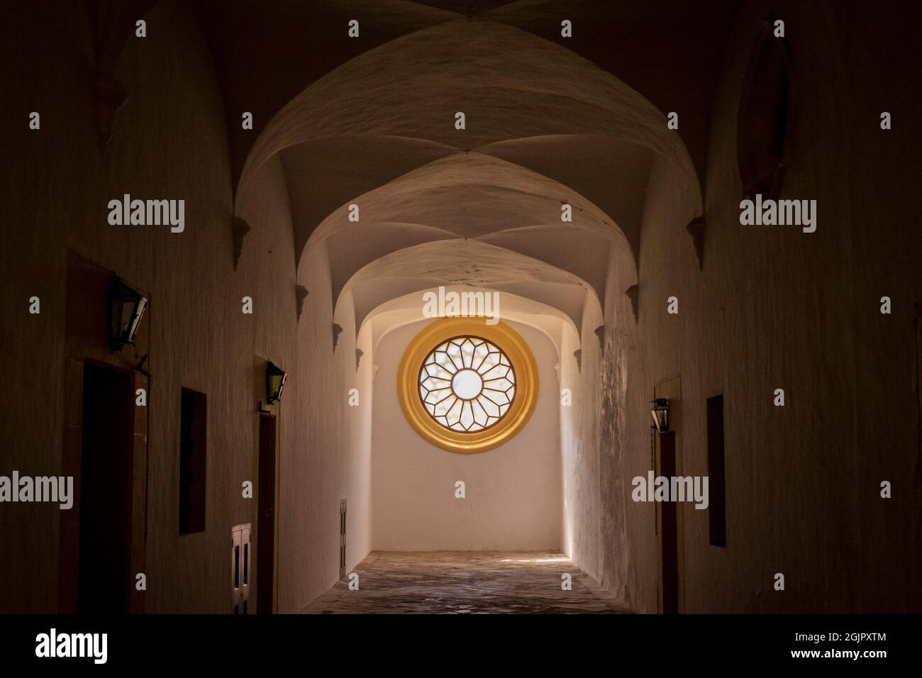 Light comes through a window at the Carthusian monastery of Valldemossa, Mallorca, Spain Stock Photo