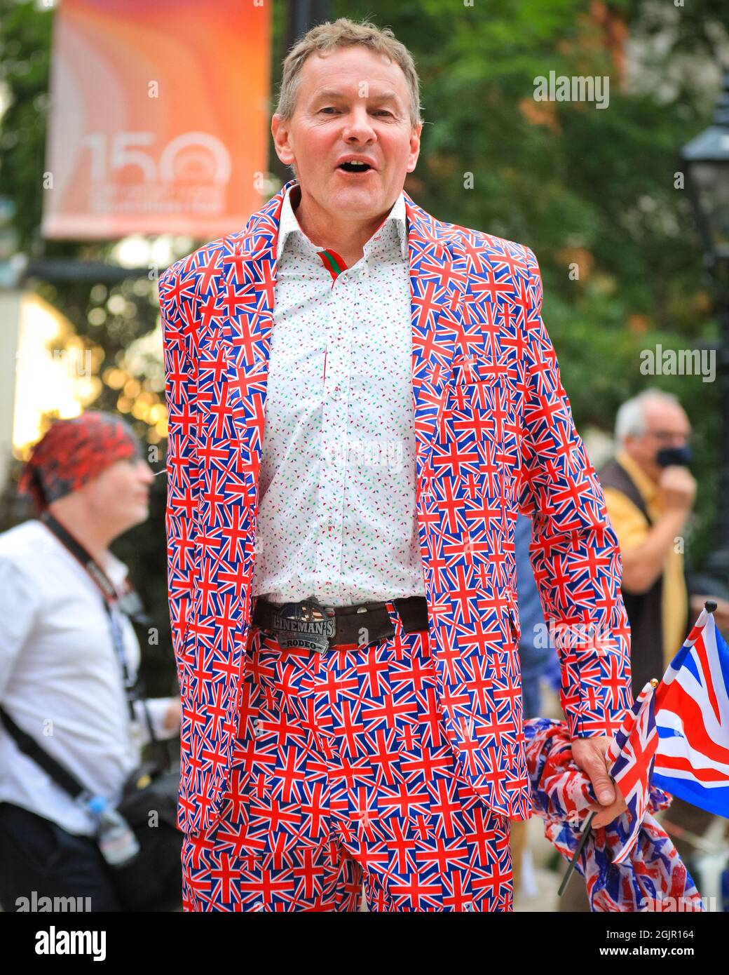 London, UK. 11th Sep, 2021. As is the longstanding tradition, many audience members arrive at the Royal Albert Hall in colourful outfits, often themed around the Union Jack, before the Last Night of the Proms 2021. Credit: Imageplotter/Alamy Live News Stock Photo