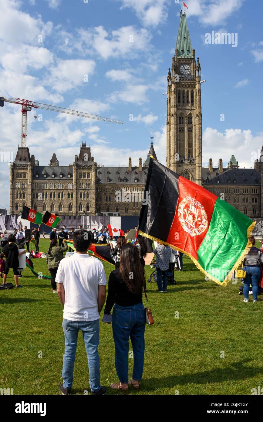 Ottawa, Canada - September 11, 2021: A crowd gathers on Parliament Hill to rally for international help for Afghans as their country is now run by the Taliban. Stock Photo