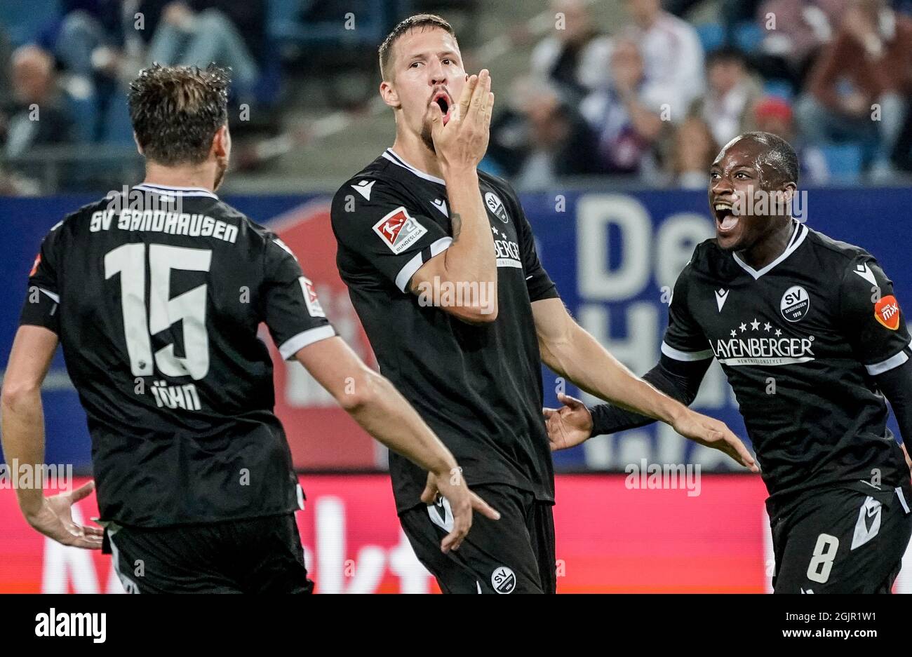 Hamburg, Germany. 11th Sep, 2021. Football: 2. Bundesliga, Hamburger SV -  SV Sandhausen, Matchday 6, at Volksparkstadion. Sandhausen's Immanuel Höhn  (l-r), Sandhausen's Janik Bachmann and Sandhausen's Christian Kinsombi  celebrate the goal for