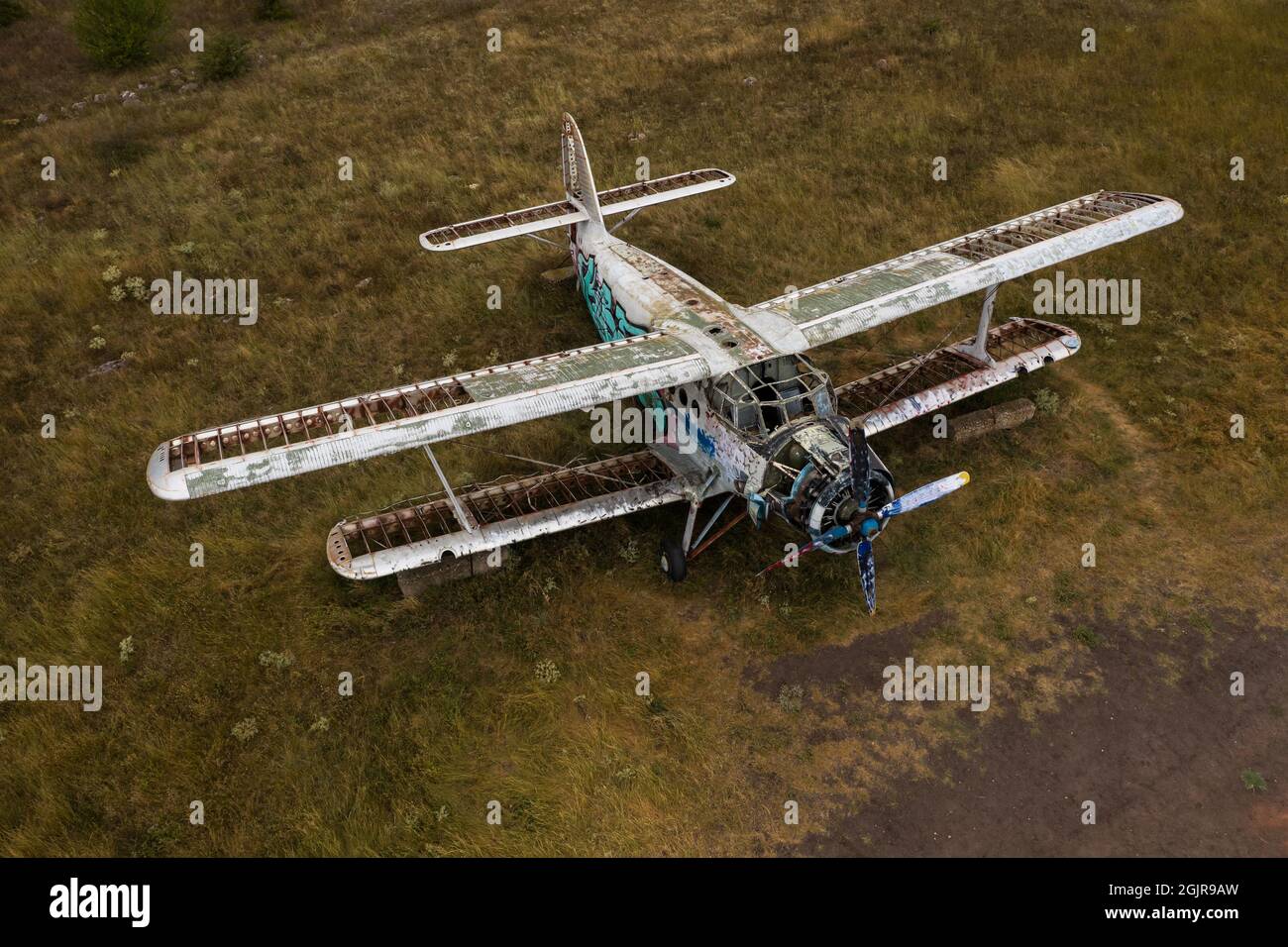 Old abandoned small airplane in the field Stock Photo - Alamy