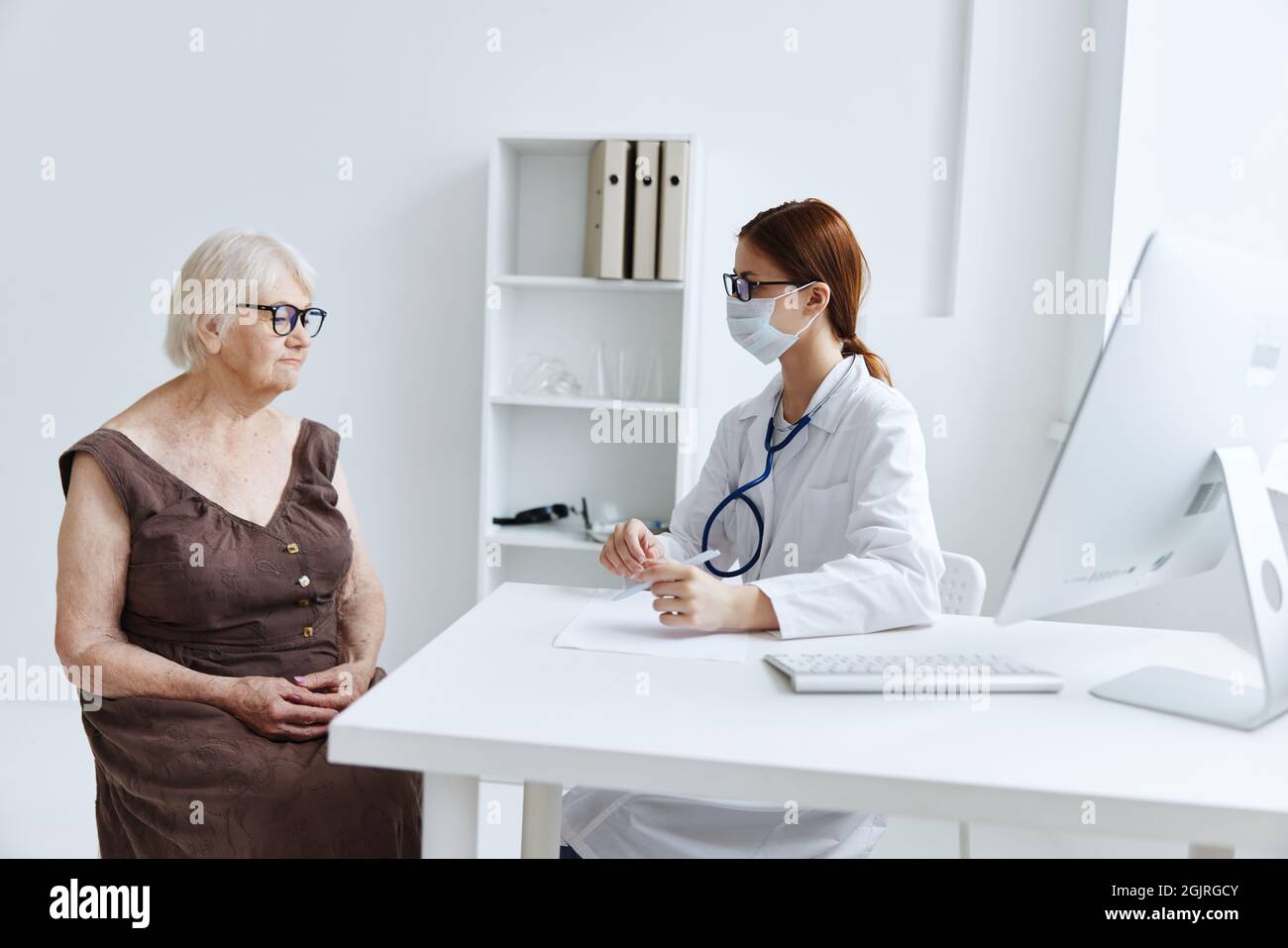 female doctor conversation with the patient health diagnostics Stock ...