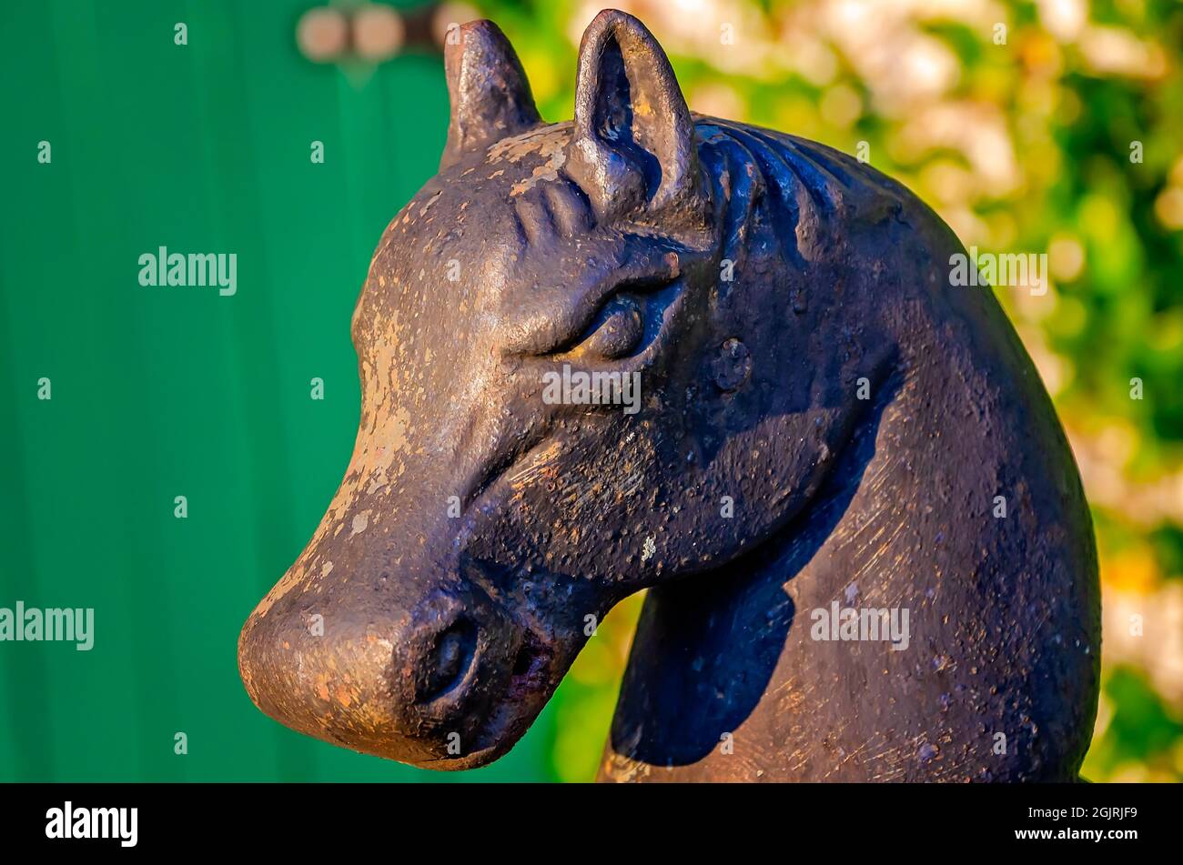 A vintage iron horse-head hitching post stands on Water Street, Sept. 5, 2021, in Biloxi, Mississippi. Stock Photo