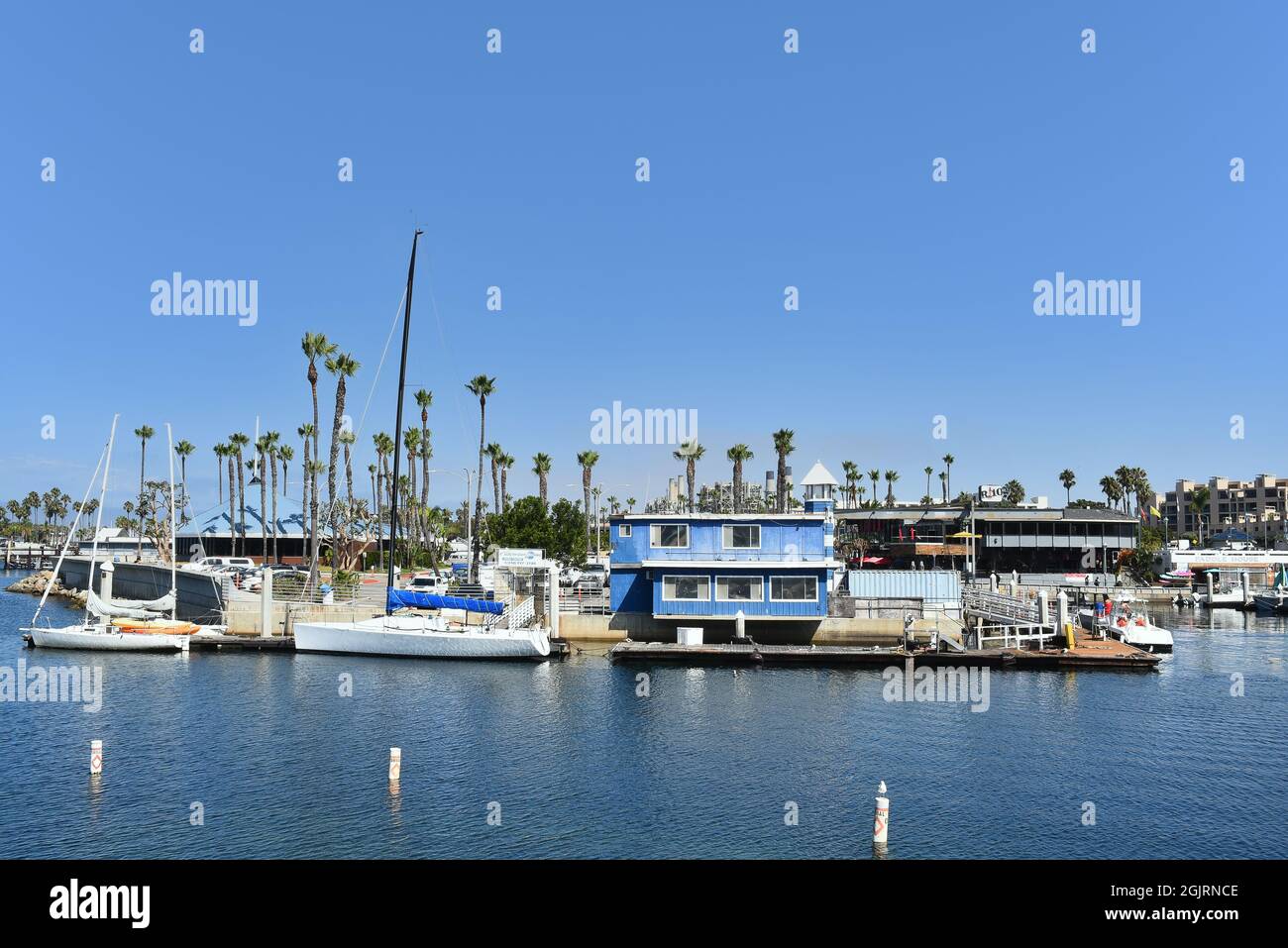 REDONDO BEACH, CALIFORNIA - 10 SEP 2021: The Redondo Beach Marina with Boats, Restaurants and Shops. Stock Photo